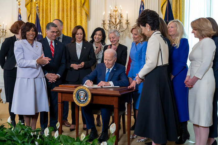 President Joe Biden signs an Executive Order on Advancing Women’s Health Research and Innovation, Monday, March 18, 2024, during a Women’s History Month reception in the East Room of the White House. Dr. Blumenthal (third from right) was invited to be in attendance with other important figures in women’s health in recognition of her pioneering leadership on the issue.(Official White House Photo by Adam Schulz)